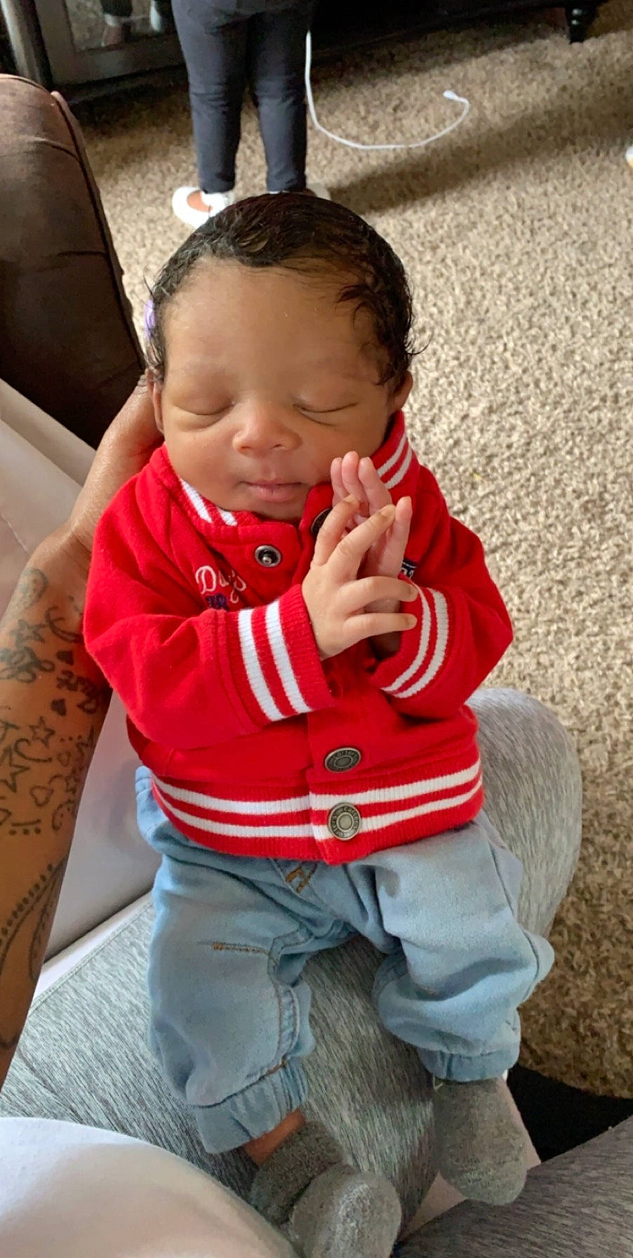 Bryson is registered to the contest to win money with this photo: baby, baby_toddler_clothing, cheek, chin, eye, face, facial_expression, finger, hand, happy, head, human_body, mouth, neck, nose, person, shoulder, skin, sleeve, smile