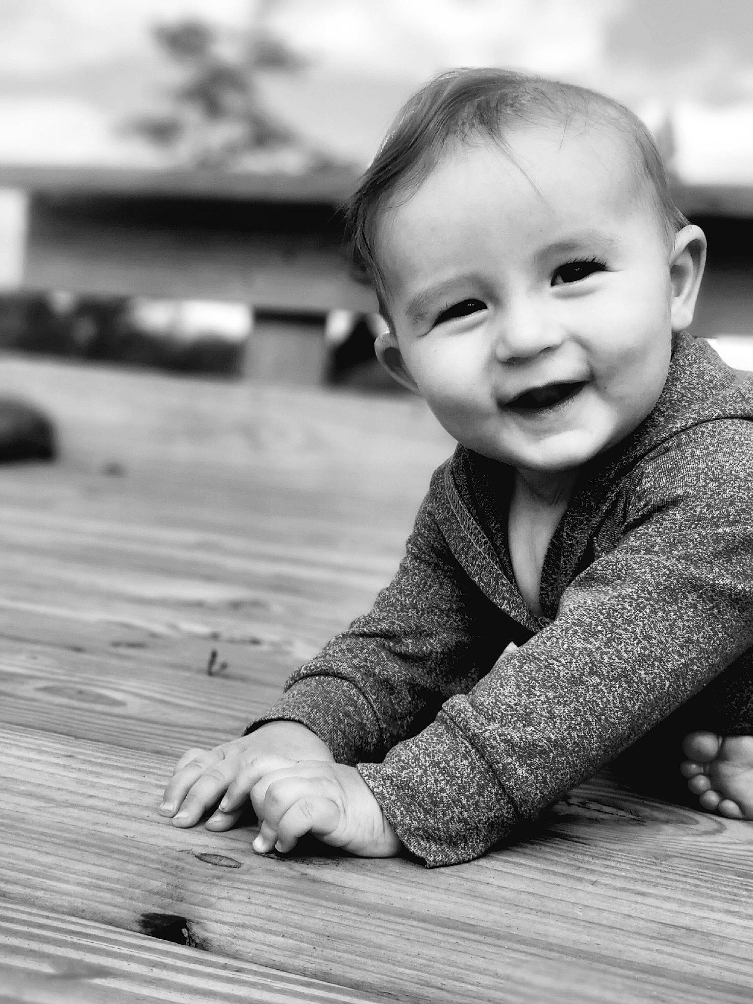 Bodhi is registered to the contest to win money with this photo: baby, baby_toddler_clothing, black, black_and_white, cheek, child, flash_photography, floor, flooring, happy, monochrome, monochrome_photography, person, skin, smile, snapshot, standing, style, toddler, white