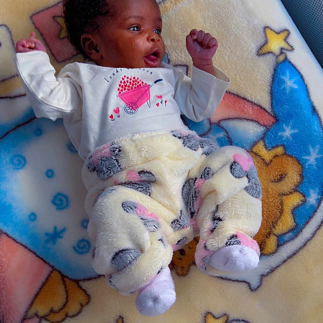 Lailani joined the competition — help win amazing prizes! baby, bed, blanket, bodypart, couch, crib, cushion, face, finger, furniture, hand, head, homedecor, infantbed, newborn, person, photography, portrait, quilt, sleeping