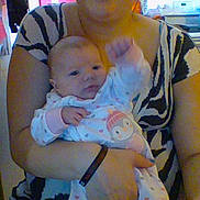 Brailyn is registered to the contest to win money with this photo: cat, child, infant, skin, toddler
