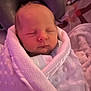 Blu is registered to the contest to win money with this photo: newborn, baby, sleeping, blanket, soft, pink, wrapped, cozy, infant, face, peaceful, child, cute, portrait, rest, warm, texture, human, indoors, comfort
