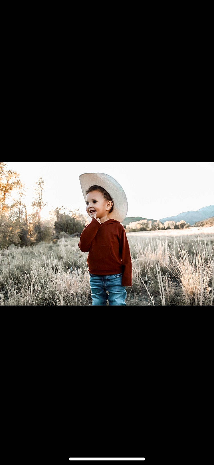 Cassius joined the competition — help win amazing prizes! cap, clothing, fashion_accessory, field, flash_photography, font, grass, grassland, happy, hat, joy, landscape, natural_landscape, people_in_nature, person, plant, prairie, sky, sun_hat, t_shirt