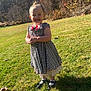 toddler, child, smiling, dress, outdoor, grass, sunlight, trees, autumn, nature, happy, person, shoes, socks, field, young_child, daylight, cute, portrait, scenic