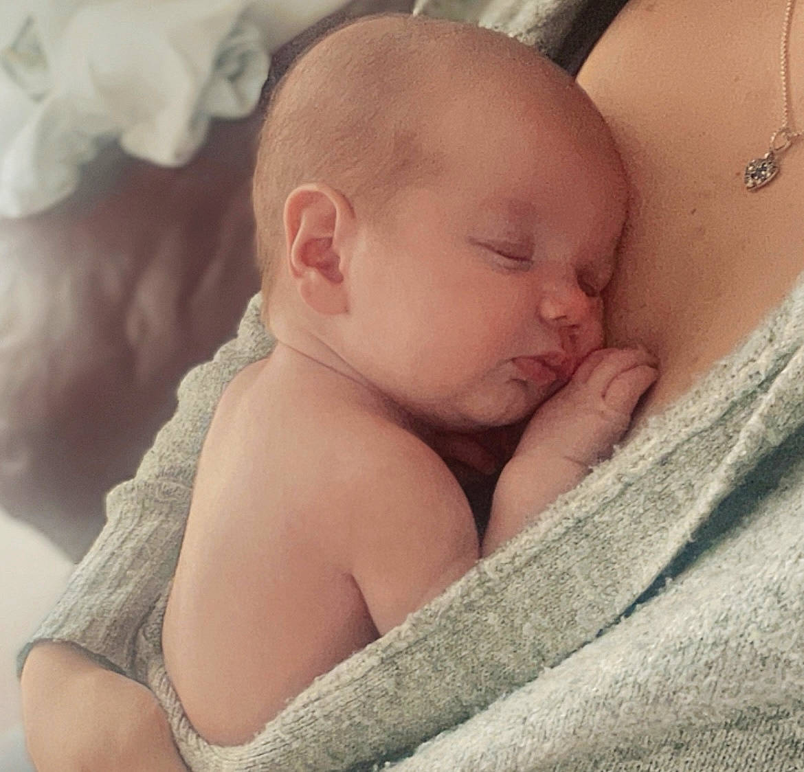 George is registered to the contest to win money with this photo: arm, baby, baby_sleeping, cheek, chin, comfort, ear, eye, eyebrow, face, finger, hand, happy, human_body, iris, mouth, neck, nose, person, skin