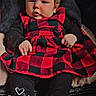 baby, black, blanket, checkered, child, clothing, cozy, cute, dress, expression, feet, indoors, infant, legs, portrait, red, sitting, timestamp, warm, weekend