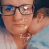 Aizzley is registered to the contest to win money with this photo: person, baby, glasses, sleeping, close_up, portrait, text_overlay, indoor, cozy, tender_moment, face, child, holding, soft_light, casual_clothing, candid, family, intimate, love, rest