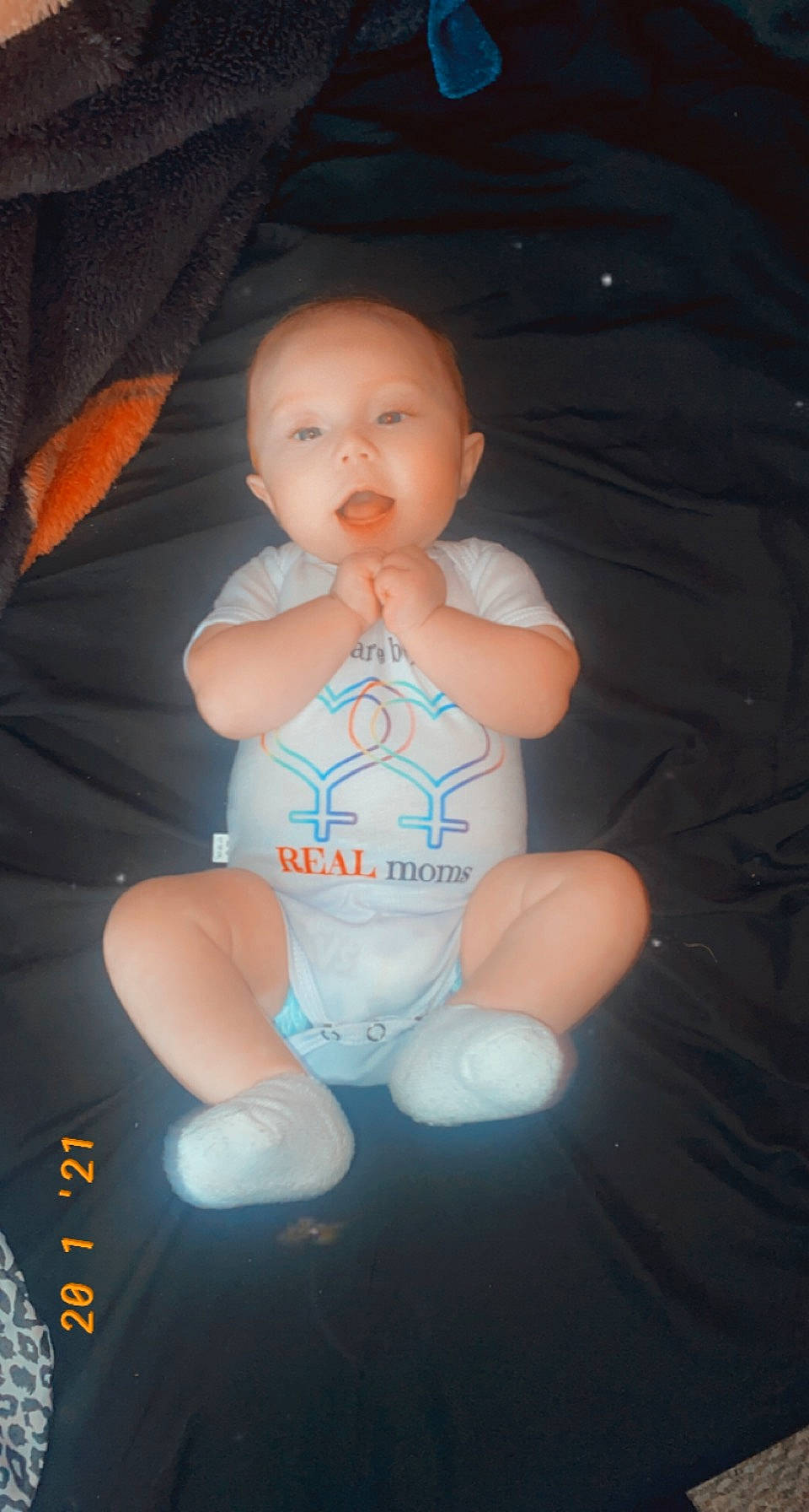 Levi is registered to the contest to win money with this photo: abdomen, arm, baby, baby_products, baby_toddler_clothing, cheek, child, comfort, eye, finger, flash_photography, foot, hand, head, nail, person, sitting, stomach, thumb, toddler