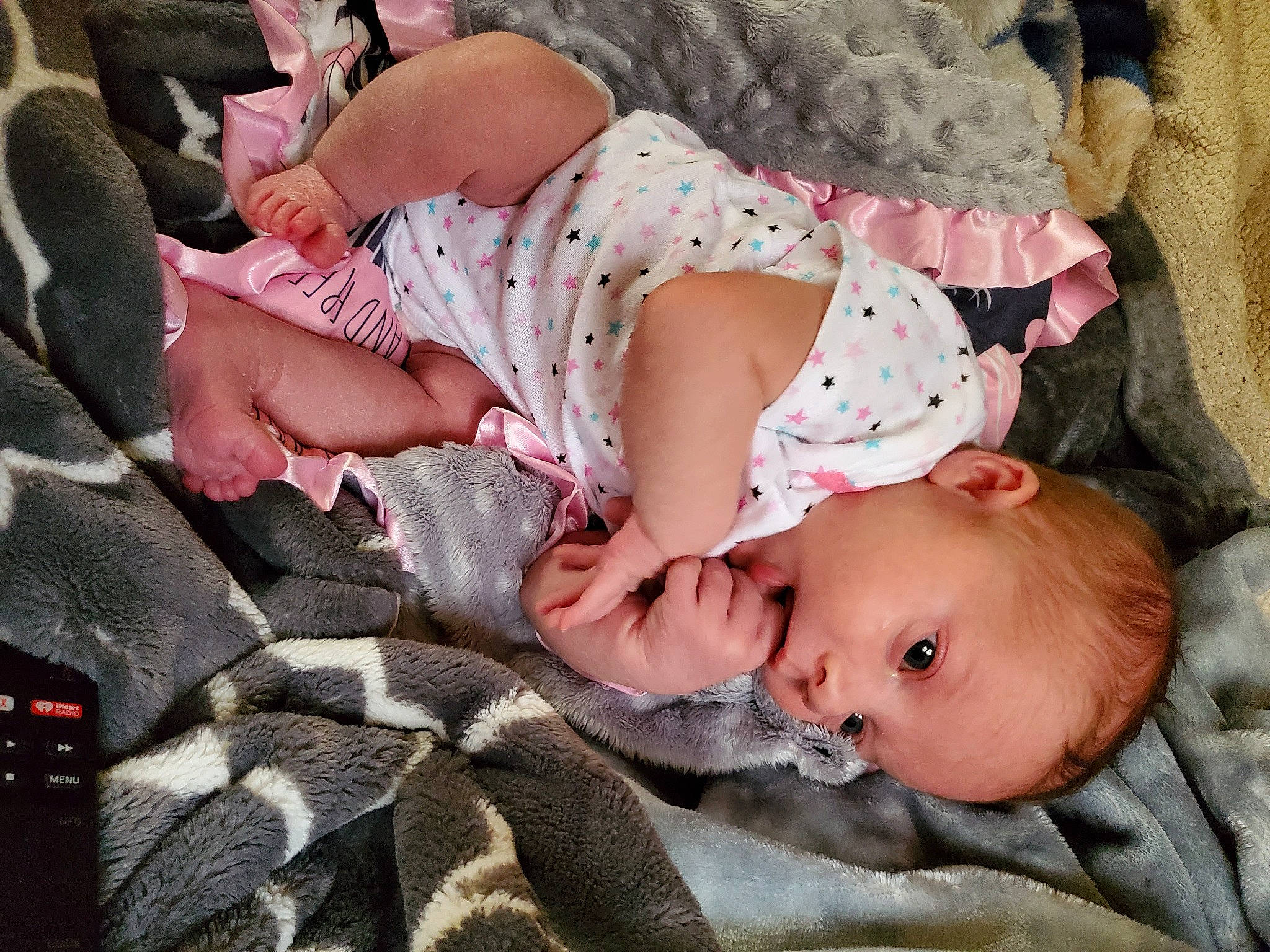 Matalee is registered to the contest to win money with this photo: baby, baby_products, baby_toddler_clothing, bedtime, cheek, child, comfort, eye, linens, nail, nap, pattern, person, pink, sitting, skin, sleep, textile, thigh, toddler