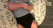 Roman joined the competition — help win amazing prizes! baby, infant, pillow, clothing, socks, pattern, fabric, bed, blanket, person, child, cute, indoors, soft, resting, looking_away, skin, head, hand, feet