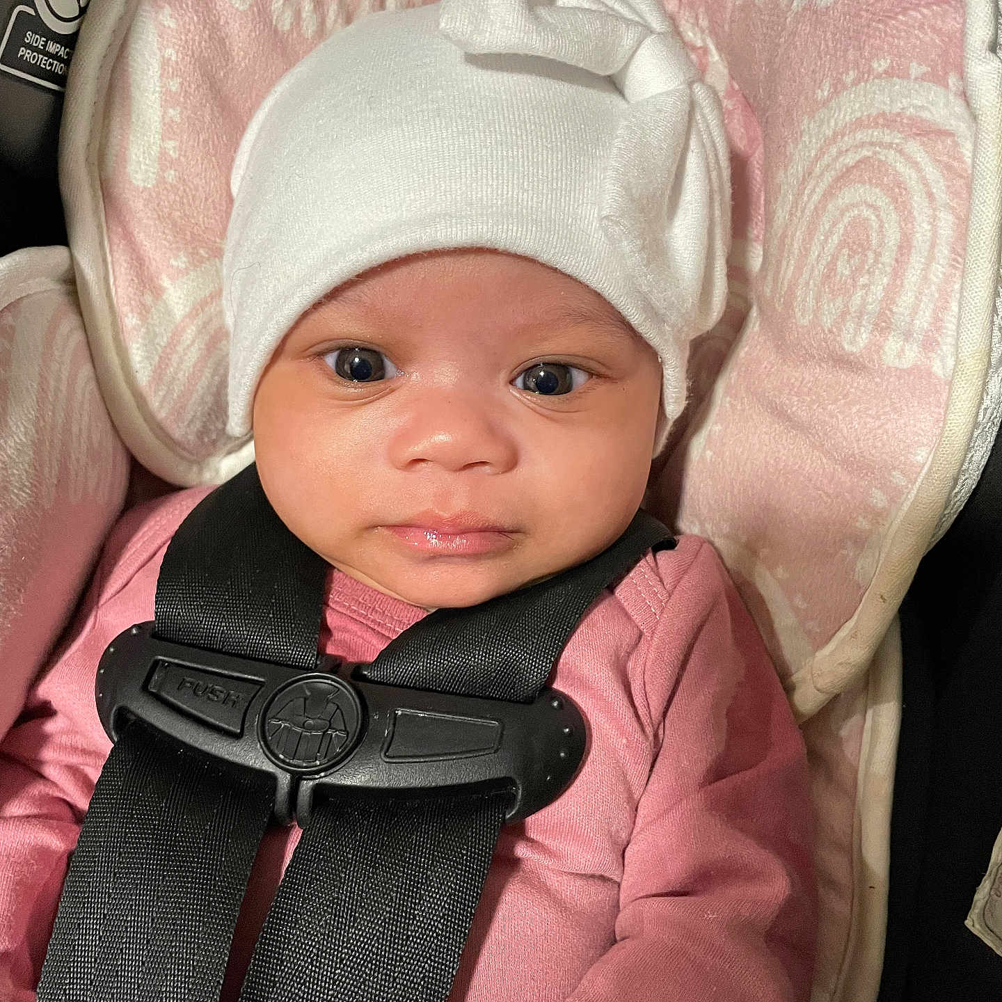 Kaliyah joined the competition — help win amazing prizes! accessories, baby, belt, bonnet, cap, car, car_interior, carseat, clothing, coat, face, hat, head, hood, jacket, person, photography, portrait, transportation, vehicle