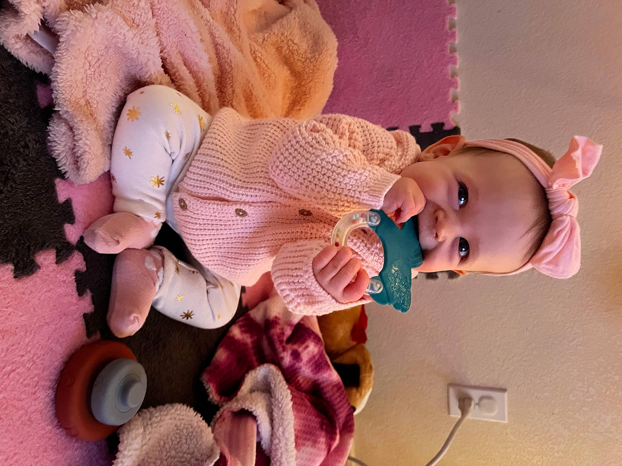 Callie joined the competition — help win amazing prizes! baby, baby_toddler_clothing, child, ear, fashion_accessory, finger, hand, happy, headgear, lip, mouth, nose, person, pink, plant, skin, smile, stuffed_toy, textile, toddler