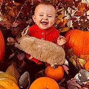 Ryleigh joined the competition — help win amazing prizes! baby, infant, child, bunny, rabbit, pumpkin, pumpkins, autumn, fall_leaves, fall, smile, laughing, red_jacket, orange, seasonal, cute, cozy, sitting, portrait, leaf_litter