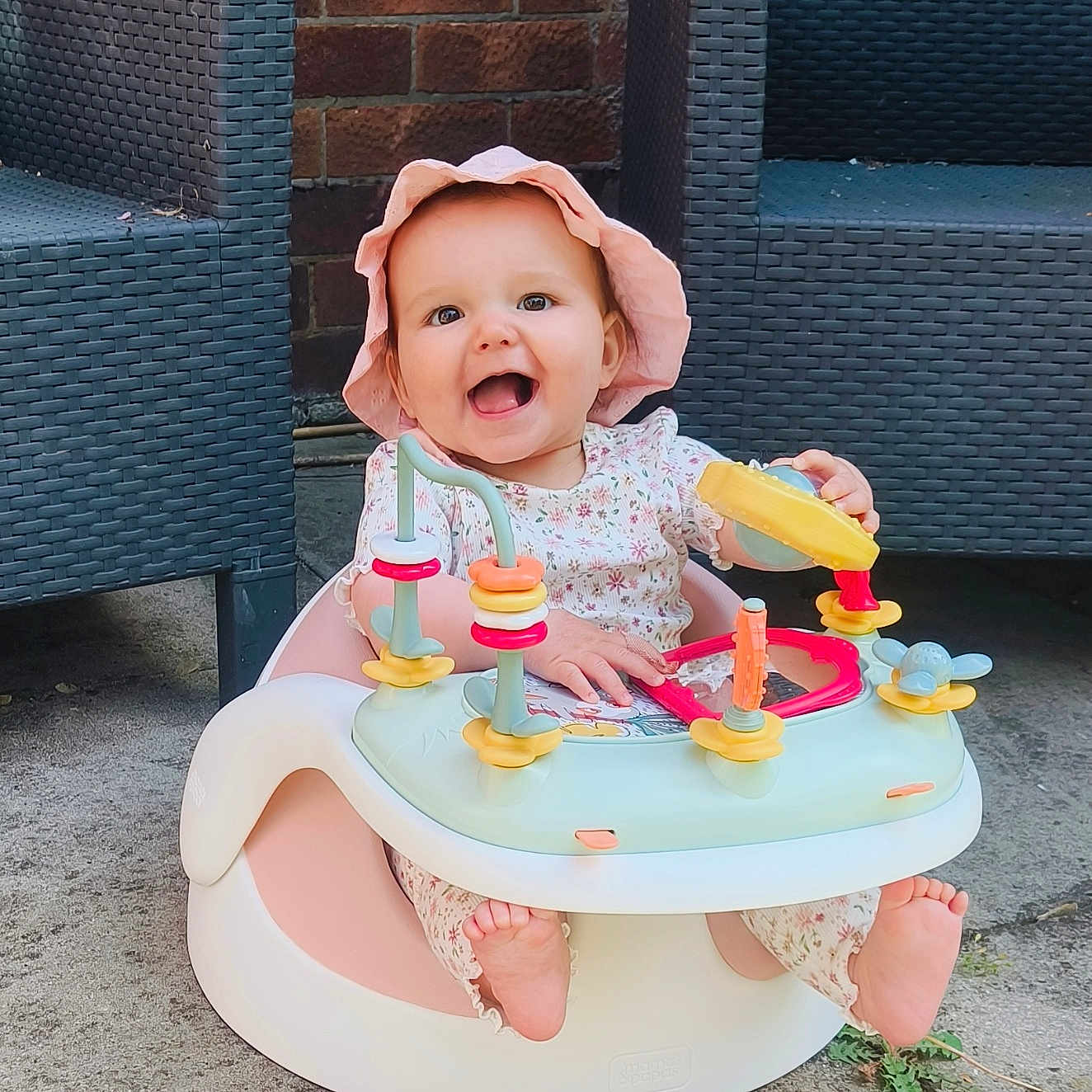 Ivy is registered to the contest to win money with this photo: baby, chair, clothing, cream, dessert, face, food, furniture, happy, hat, head, icecream, indoors, person, photography, plant, portrait, pottedplant, sitting, summer