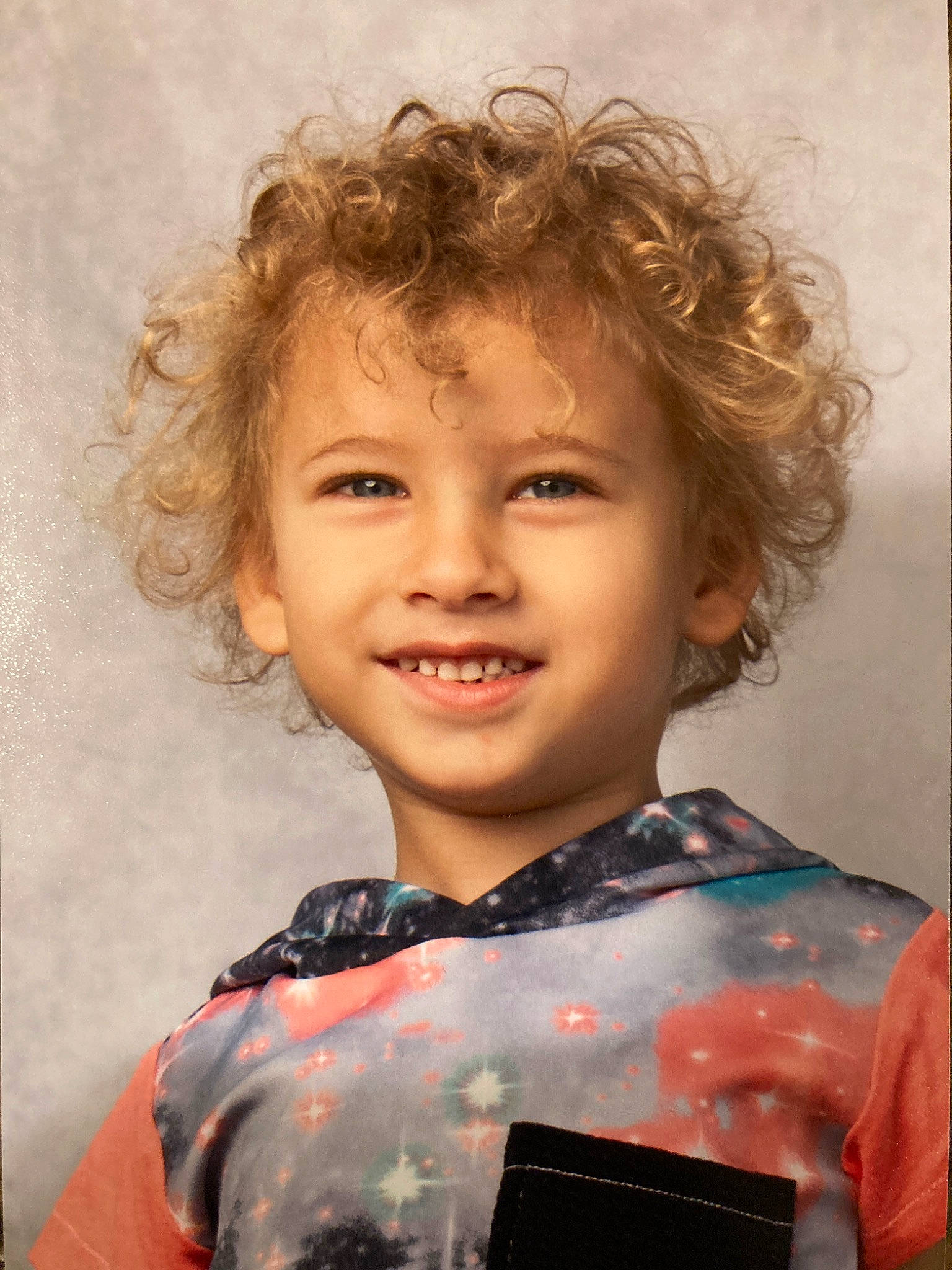 Bowie is registered to the contest to win money with this photo: beauty, blond, cheek, child, chin, eyebrow, fashion_design, flash_photography, fun, happy, iris, joy, lip, neck, organ, person, personal_protective_equipment, skin, sleeve, smile