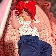 Tiana joined the competition — help win amazing prizes! baby, sleeping, red_bow, pacifier, polka_dot, onesie, pants, blanket, crocheted, pink, blue, infant, cute, cozy, resting, newborn, child, soft, indoors, portrait