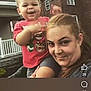 Keyon Carter is registered to the contest to win money with this photo: toddler, child, woman, outdoor, brick_building, smile, happy, shoulder_ride, red_shirt, person, facial_expression, daylight, casual, playful, family, portrait, young_child, cute, fun, affection
