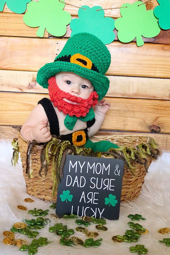 Brandon joined the competition — help win amazing prizes! art, cap, christmas_ornament, costume_hat, event, fictional_character, font, grass, green, handwriting, happy, hat, headwear, holiday, lawn_ornament, leprechaun, person, plant, smile, tree