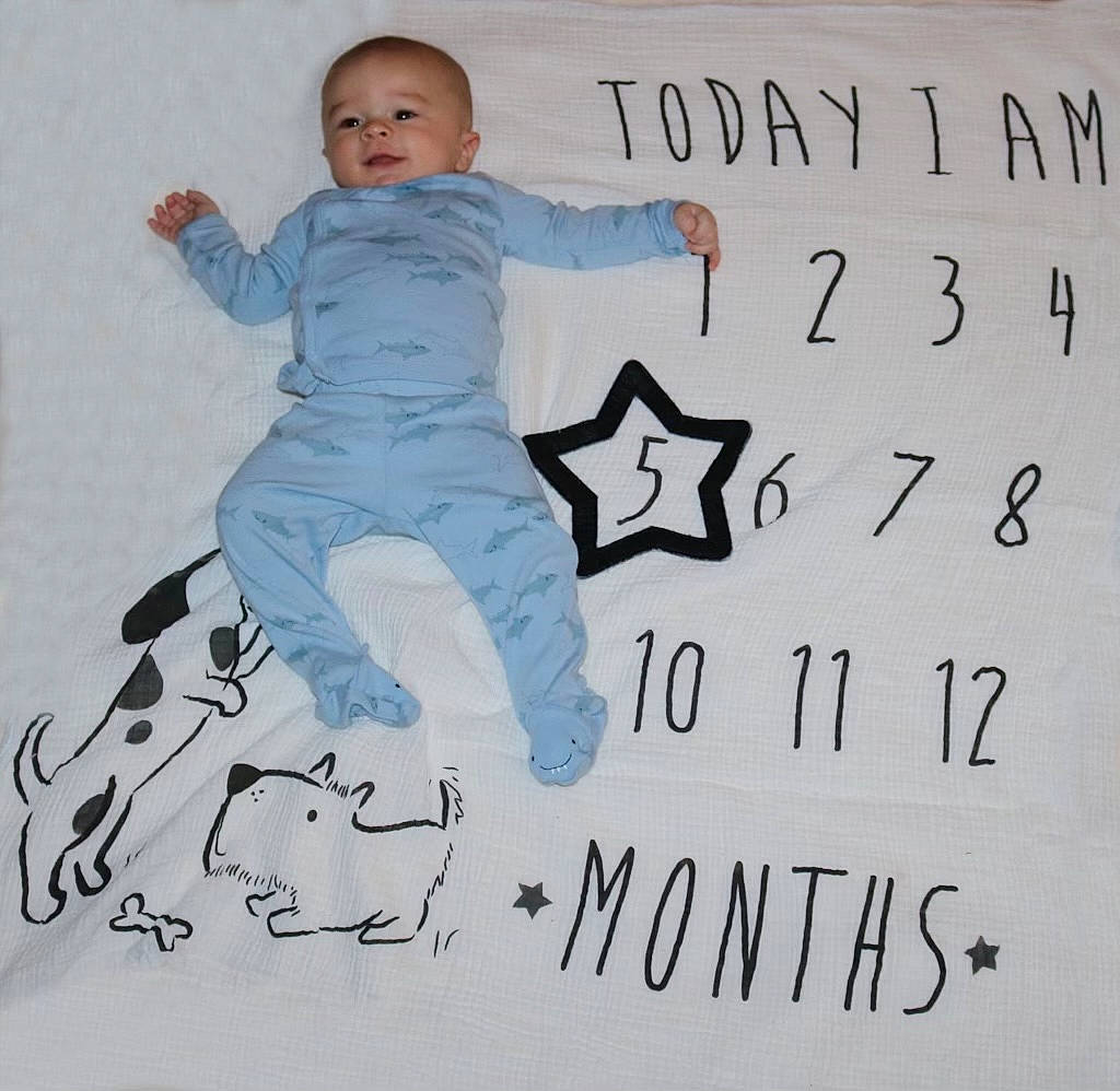 Brandon joined the competition — help win amazing prizes! baby, baby_toddler_clothing, child, electric_blue, font, gesture, happy, illustration, linens, martial_arts_uniform, pajamas, pattern, person, sleeve, t_shirt, toddler