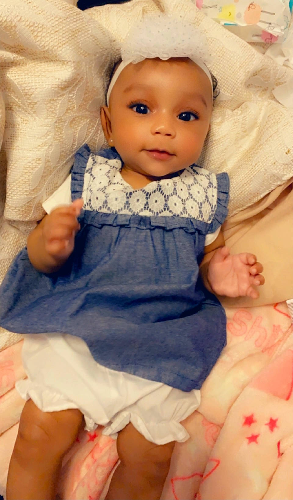 Kamari joined the competition — help win amazing prizes! baby, baby_toddler_clothing, cheek, child, comfort, eye, face, facial_expression, finger, happy, human, iris, pattern, person, pink, skin, sleeve, textile, thigh, toddler