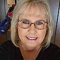 Joy T.