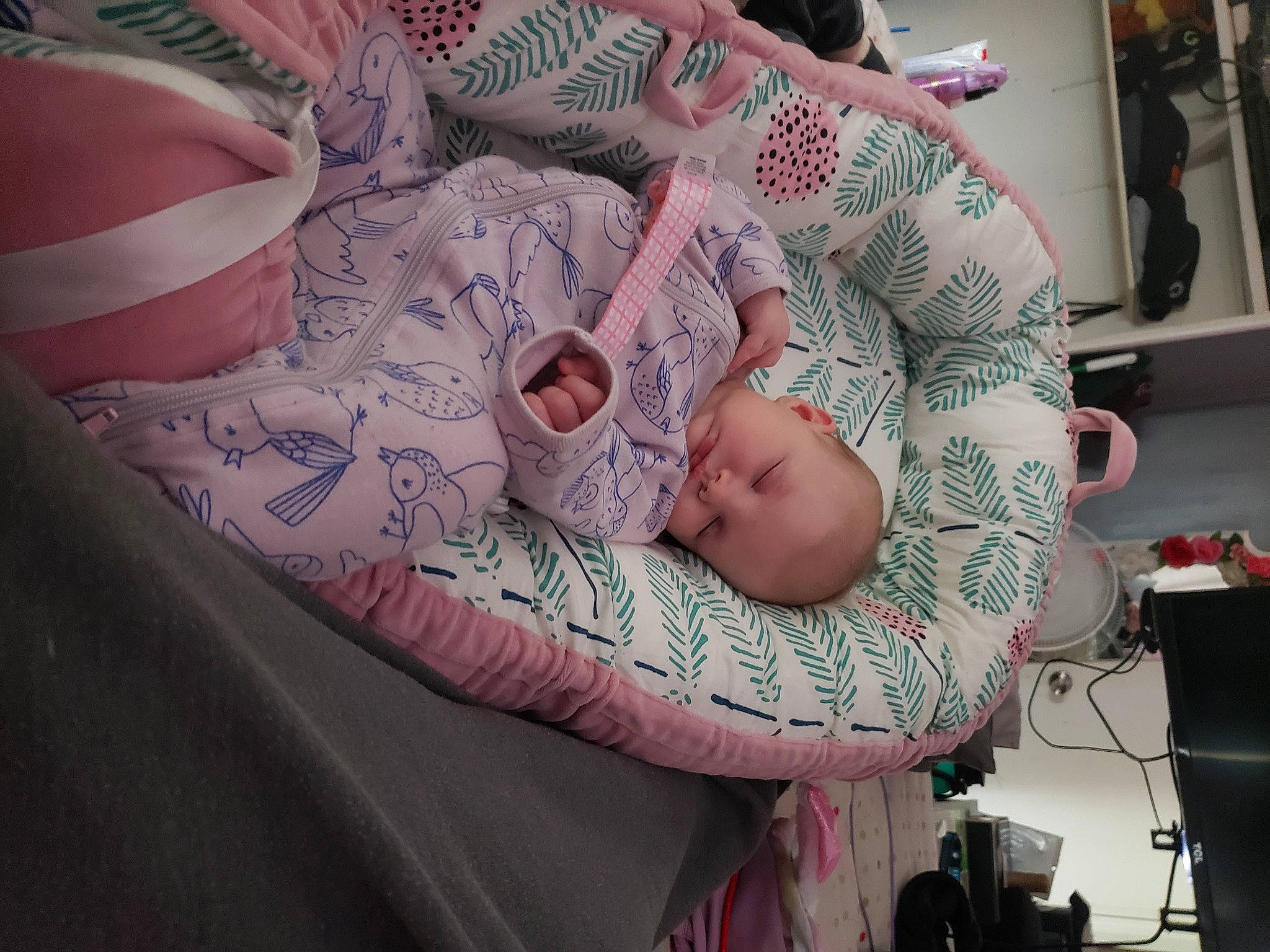Zaylee is registered to the contest to win money with this photo: arm, baby, baby_carriage, baby_products, baby_toddler_clothing, cheek, child, comfort, flesh, hat, nail, nap, pattern, person, pink, room, sitting, sleep, tire, toddler