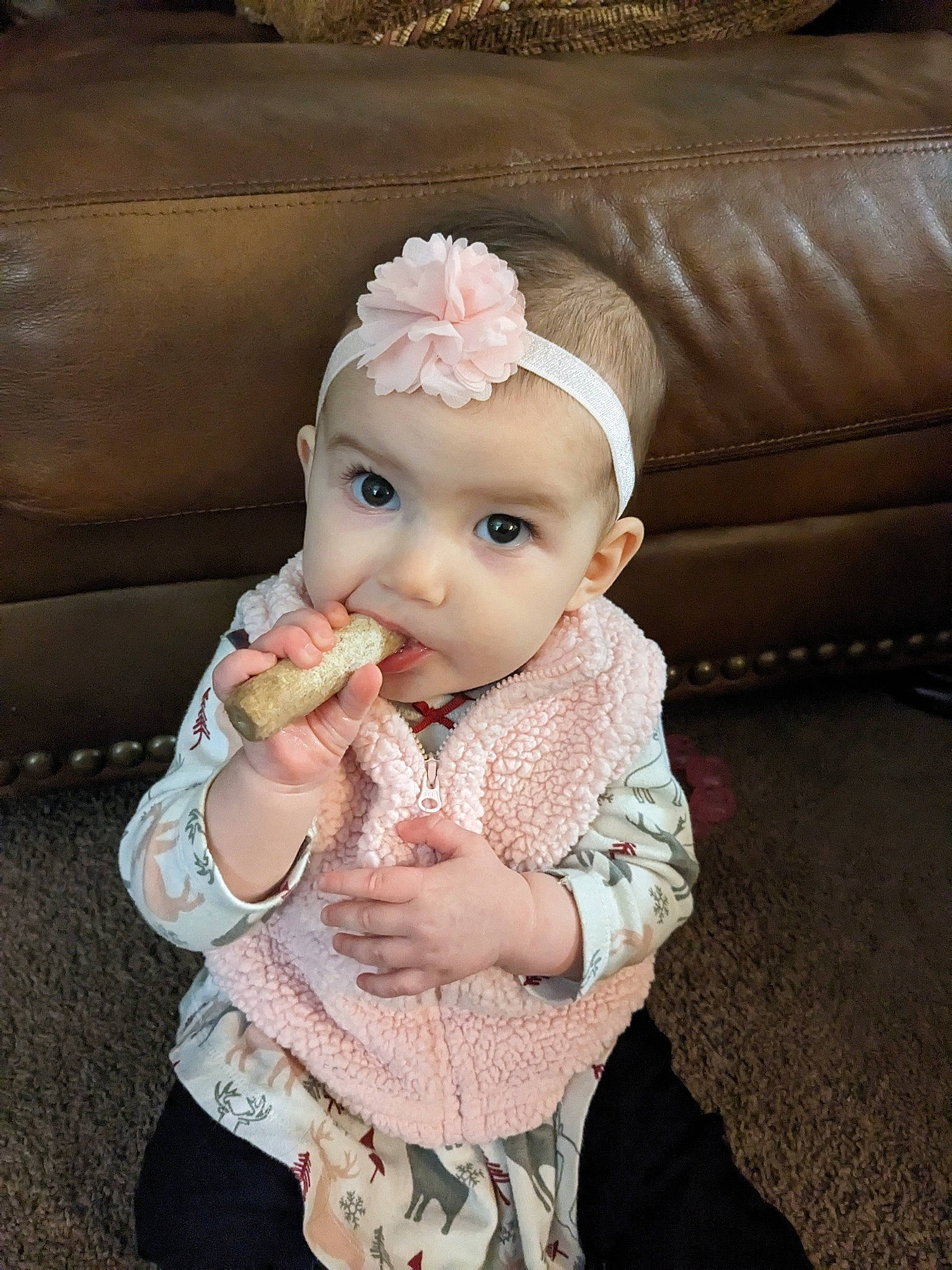 Nyx is registered to the contest to win money with this photo: baby, baby_toddler_clothing, cheek, child, embellishment, fashion_accessory, hair_accessory, headband, headgear, headpiece, headwear, jewellery, lip, pattern, person, pink, skin, sleeve, studio_couch, tableware