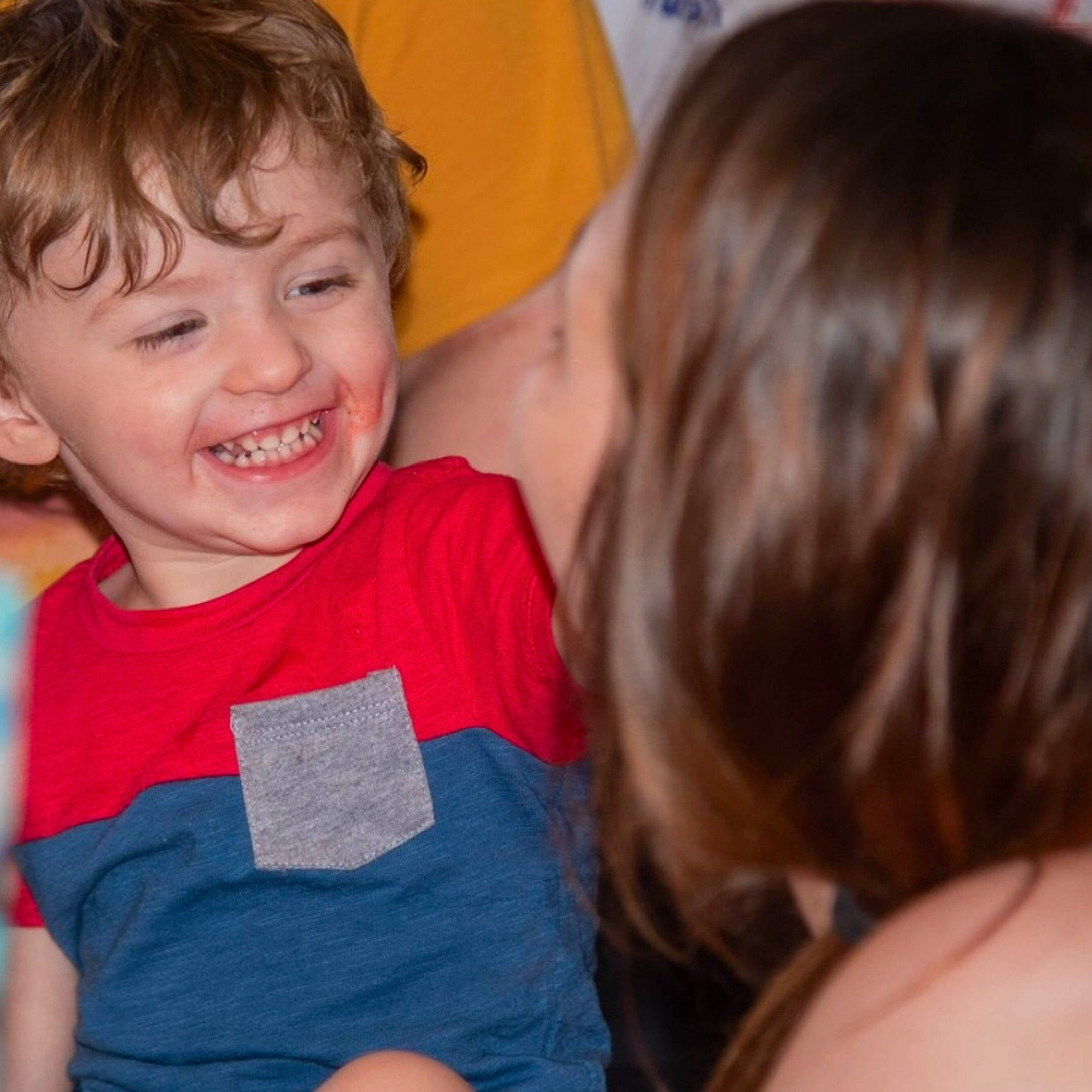 Brighton is registered to the contest to win money with this photo: arm, child, ear, facial_expression, fun, gesture, happy, interaction, joy, kindergarten, laugh, people, person, play, sibling, smile, t_shirt, toddler, tooth, vacation