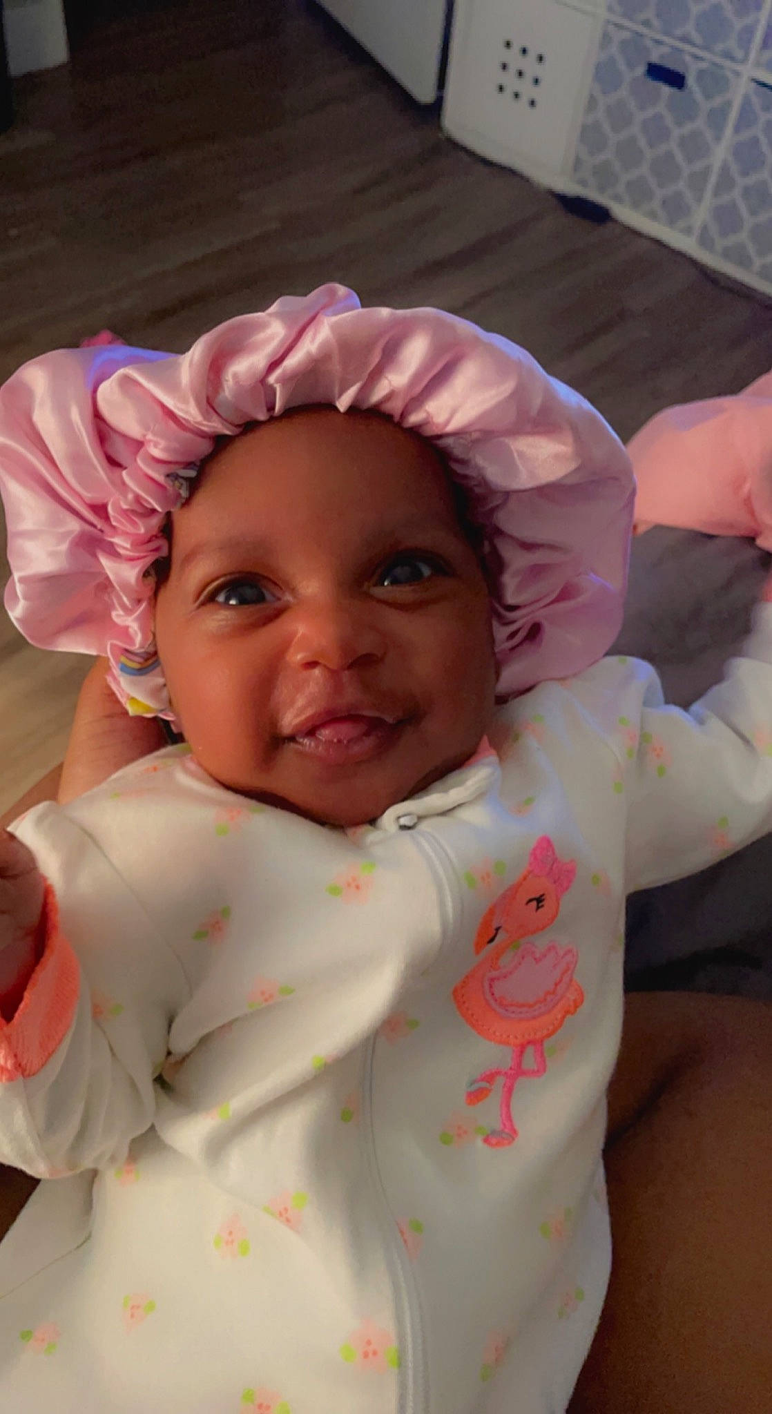 Winterlynn is registered to the contest to win money with this photo: baby, baby_toddler_clothing, cheek, child, chin, face, finger, fun, gesture, hand, happy, headwear, joy, lip, mouth, nose, person, pink, skin, sleeve