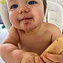Sacha participe au concours pour gagner de l'argent avec cette photo : baby, child, blue_eyes, chubby_cheeks, close_up, face, hand, holding, biscuit, food, high_chair, infant, cute, skin, expression, portrait, young, fingers, sitting, indoor