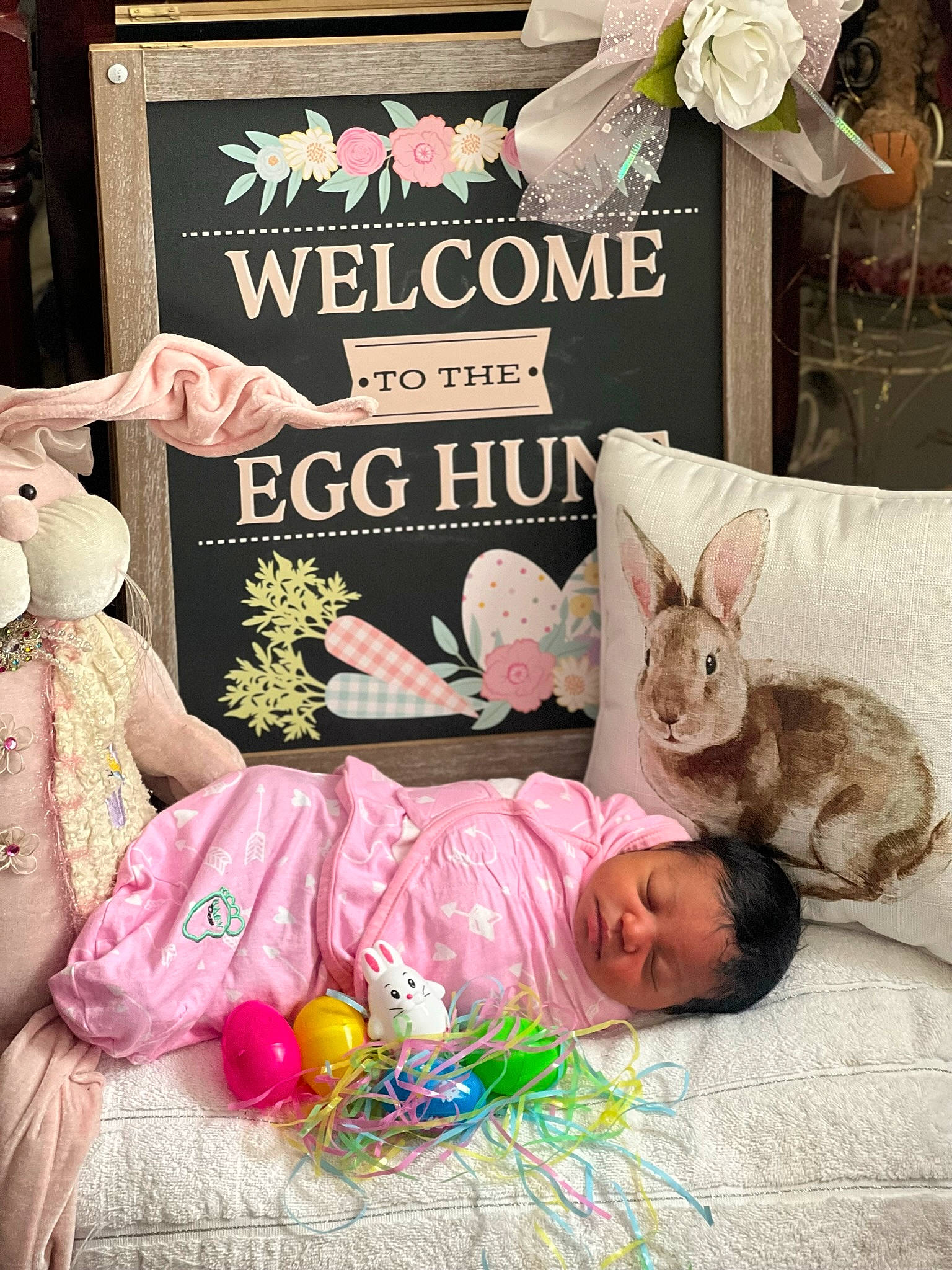 Dior is registered to the contest to win money with this photo: baby_toddler_clothing, bed, bed_sheet, bedding, child, event, fawn, font, happy, linens, magenta, pattern, peach, person, petal, photo_caption, pink, product, room, stuffed_toy