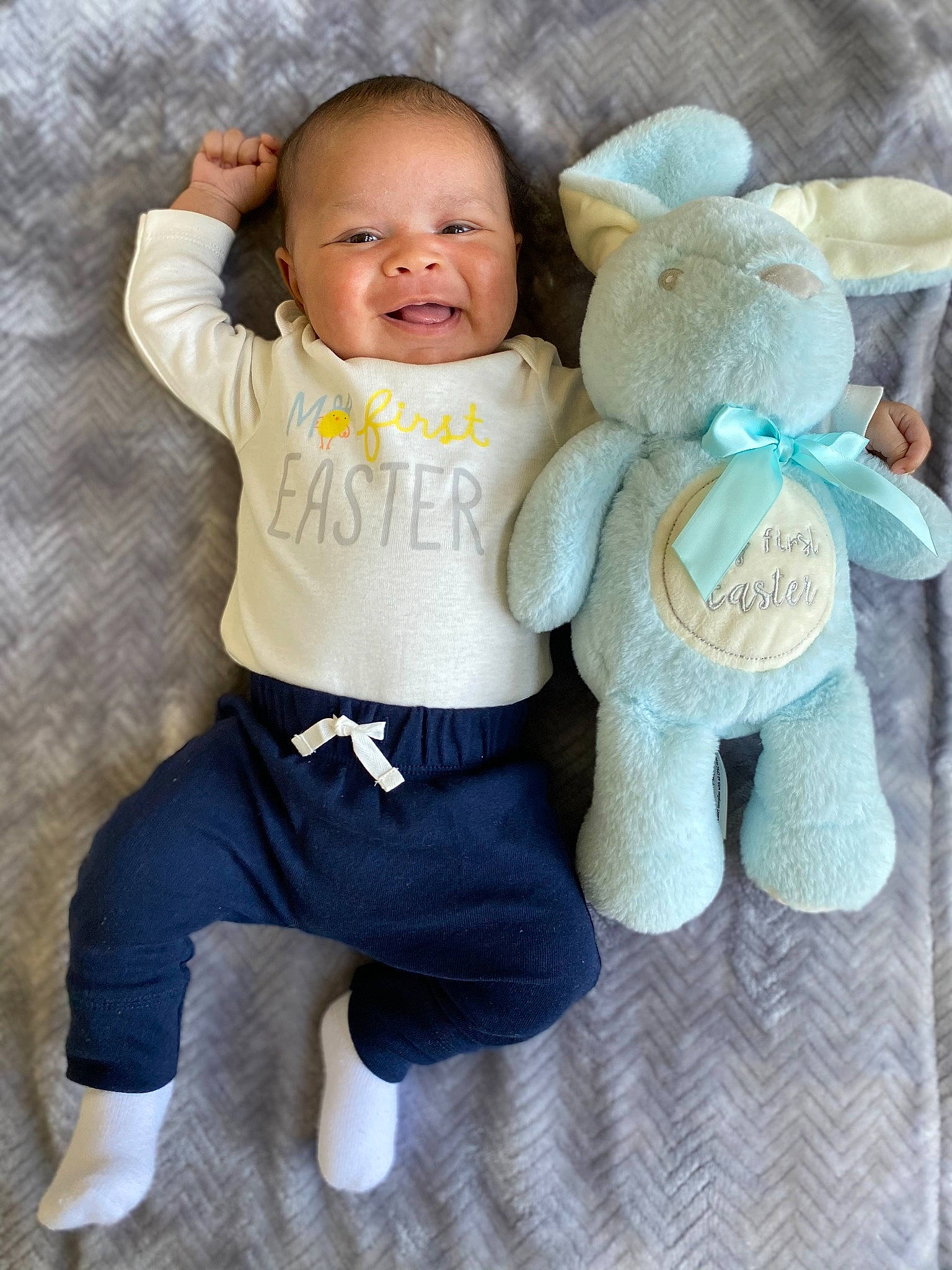 Caiden joined the competition — help win amazing prizes! baby, baby_products, baby_toddler_clothing, doll, fashion_accessory, finger, font, gesture, hand, happy, head, person, plush, skin, sleeve, smile, stuffed_toy, t_shirt, toddler, toy
