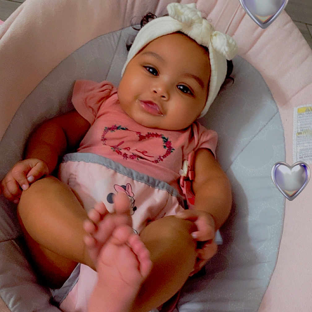 Kourtlynn joined the competition — help win amazing prizes! baby, bed, bodypart, bonnet, cap, clothing, cradle, crib, face, finger, furniture, hand, hardwood, hat, head, infantbed, newborn, person, photography, portrait