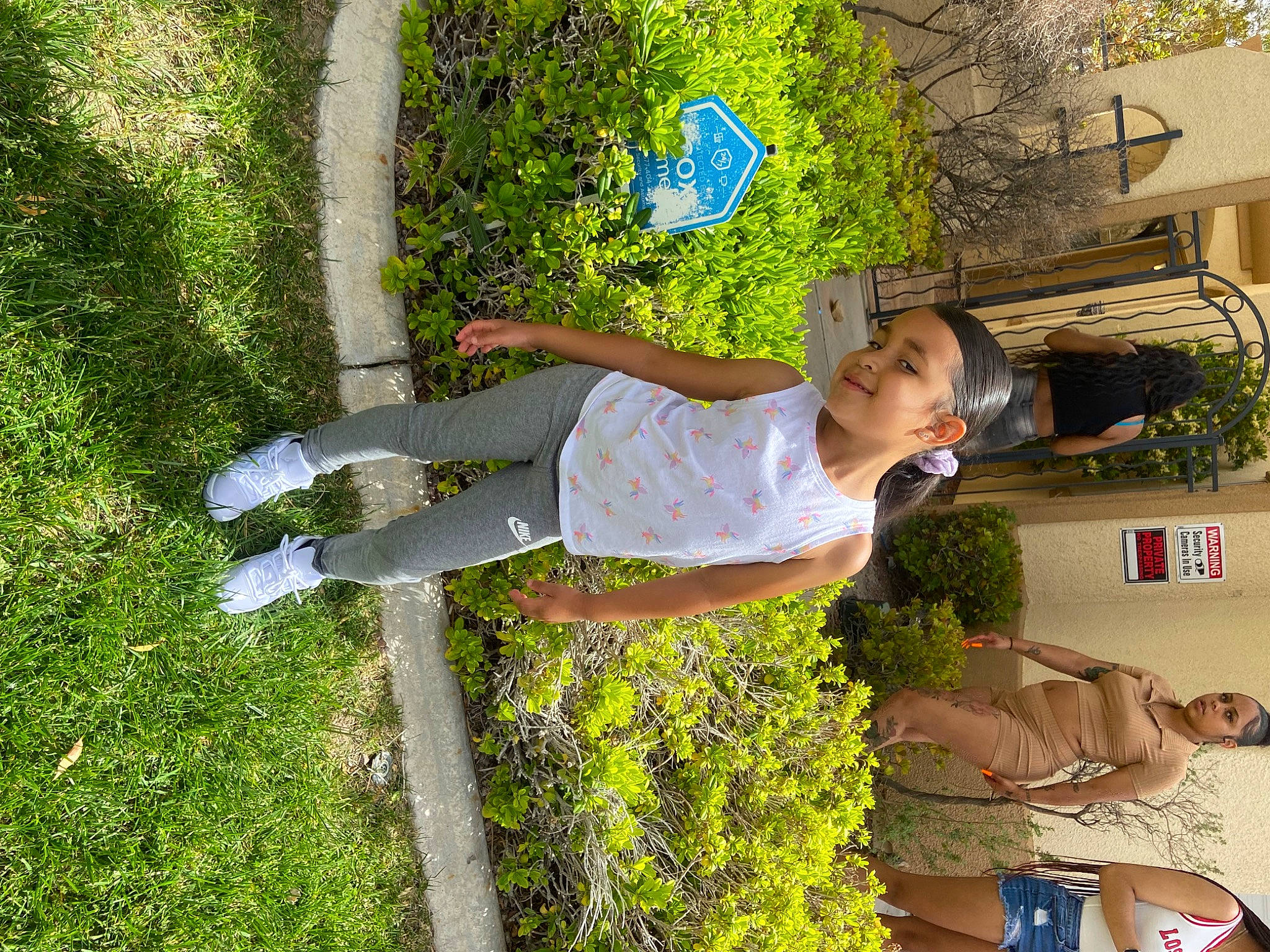 Jaylani joined the competition — help win amazing prizes! child, fun, garden, grass, happy, headwear, joy, leg, leisure, people_in_nature, person, plant, play, recreation, shorts, shrub, sitting, t_shirt, toddler, yard