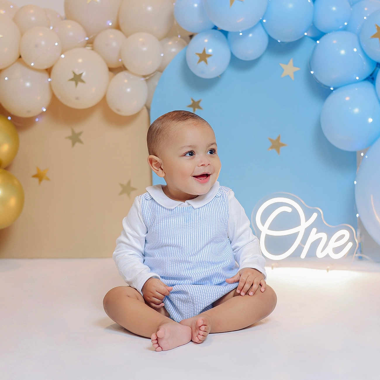 Noah is registered to the contest to win money with this photo: accessories, baby, balloon, clothing, crawling, face, formalwear, fun, happy, head, party, people, person, photography, portrait, shorts, sitting, smile, sphere, tie