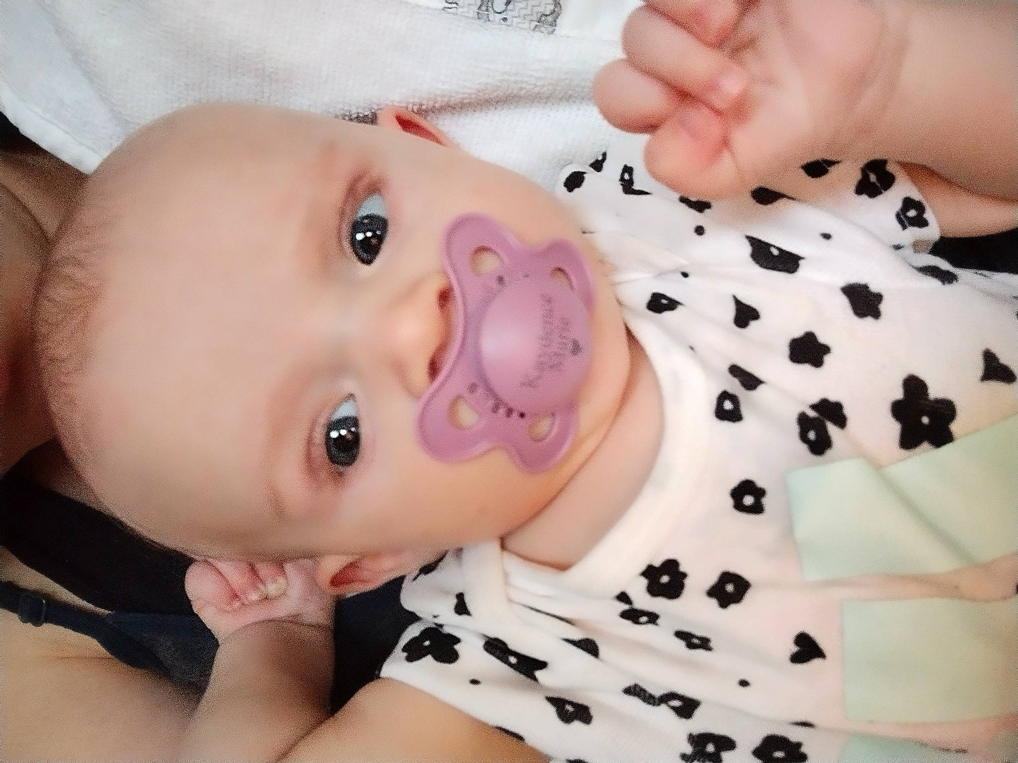 Kaydence joined the competition — help win amazing prizes! baby, baby_toddler_clothing, cheek, eye, eyebrow, eyelash, face, facial_expression, finger, gesture, hand, iris, lip, mouth, nose, person, pink, skin, sleeve, textile