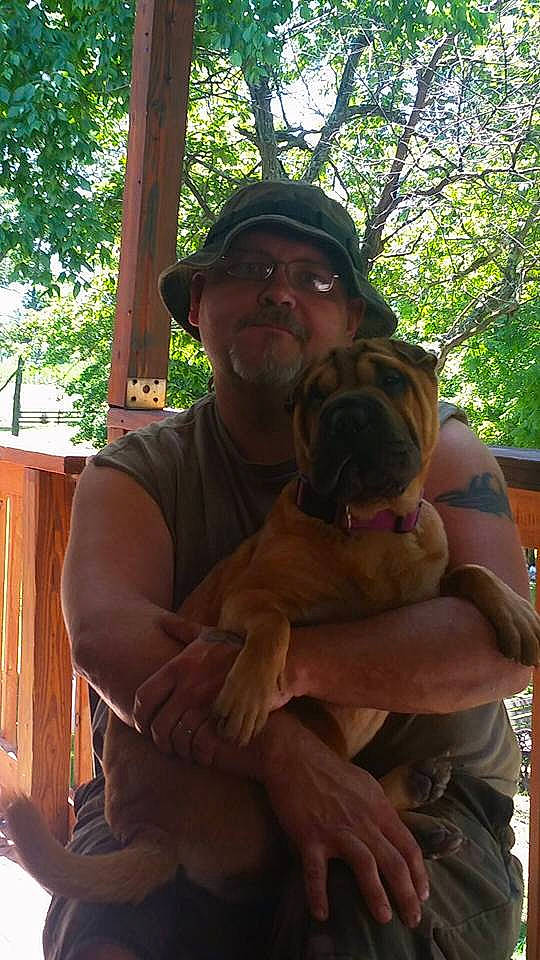 Copper is registered to the contest to win money with this photo: bullmastiff, carnivoran, dog, dog_breed, dog_crossbreeds, dog_like_mammal, mammal, person, snout, vertebrate