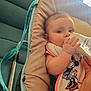 baby, bib, bottle, child, clothing, comfort, cushion, cute, face, feeding, feeding_bottle, hand, indoor, infant, mickey_mouse, person, relax, seat, sunlight, toy