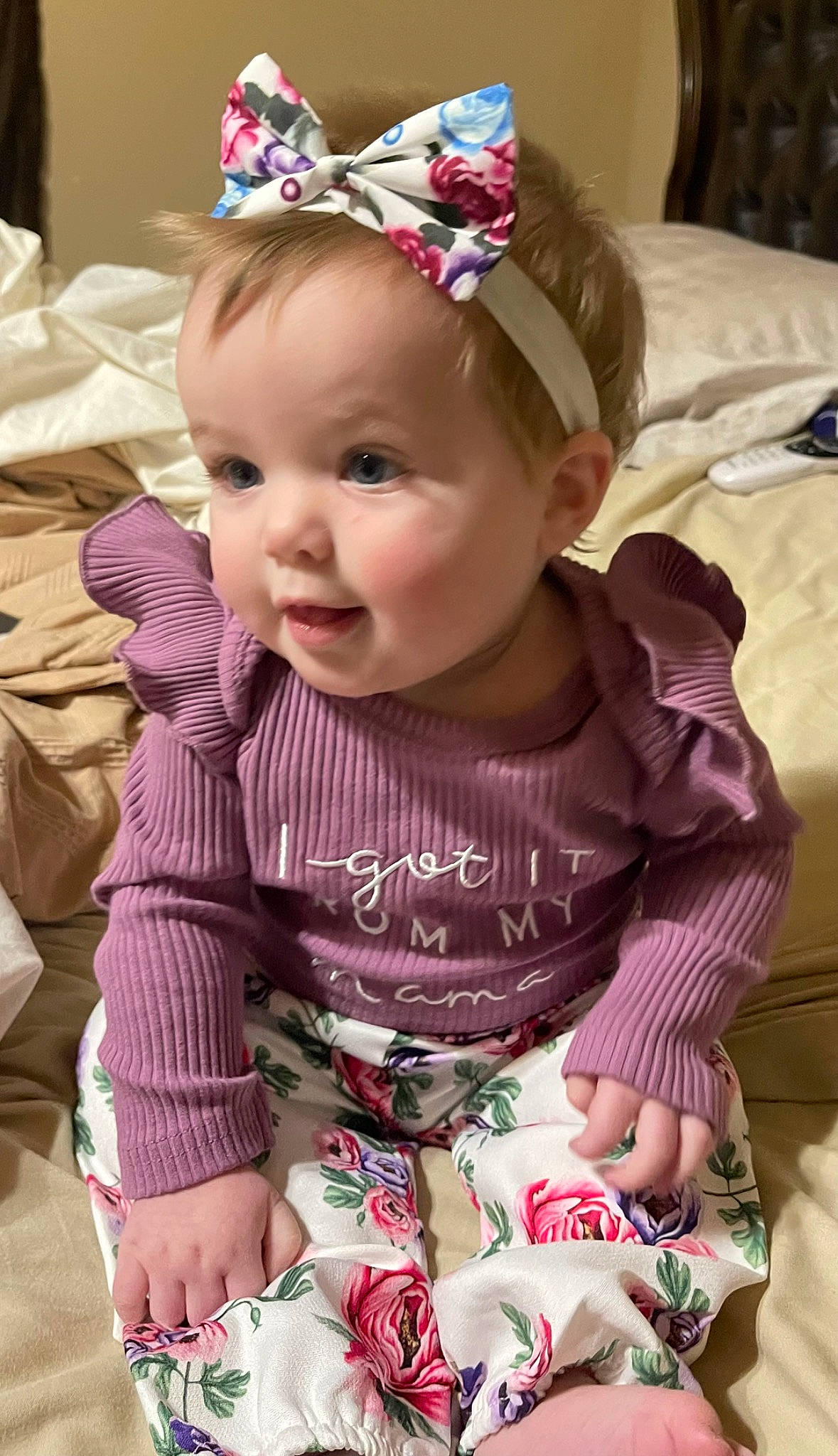 Pfeiffer is registered to the contest to win money with this photo: baby, baby_toddler_clothing, cheek, child, clothing, dress, eye, happy, headgear, iris, lip, person, pink, product, purple, skin, sleeve, smile, textile, toddler