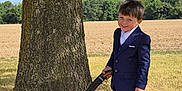 Ryder-Gene joined the competition — help win amazing prizes! boy, casual, child, daytime, field, grass, happy, nature, outdoor, person, playful, portrait, posing, shoes, smile, suit, sunlight, toy_gun, tree, young