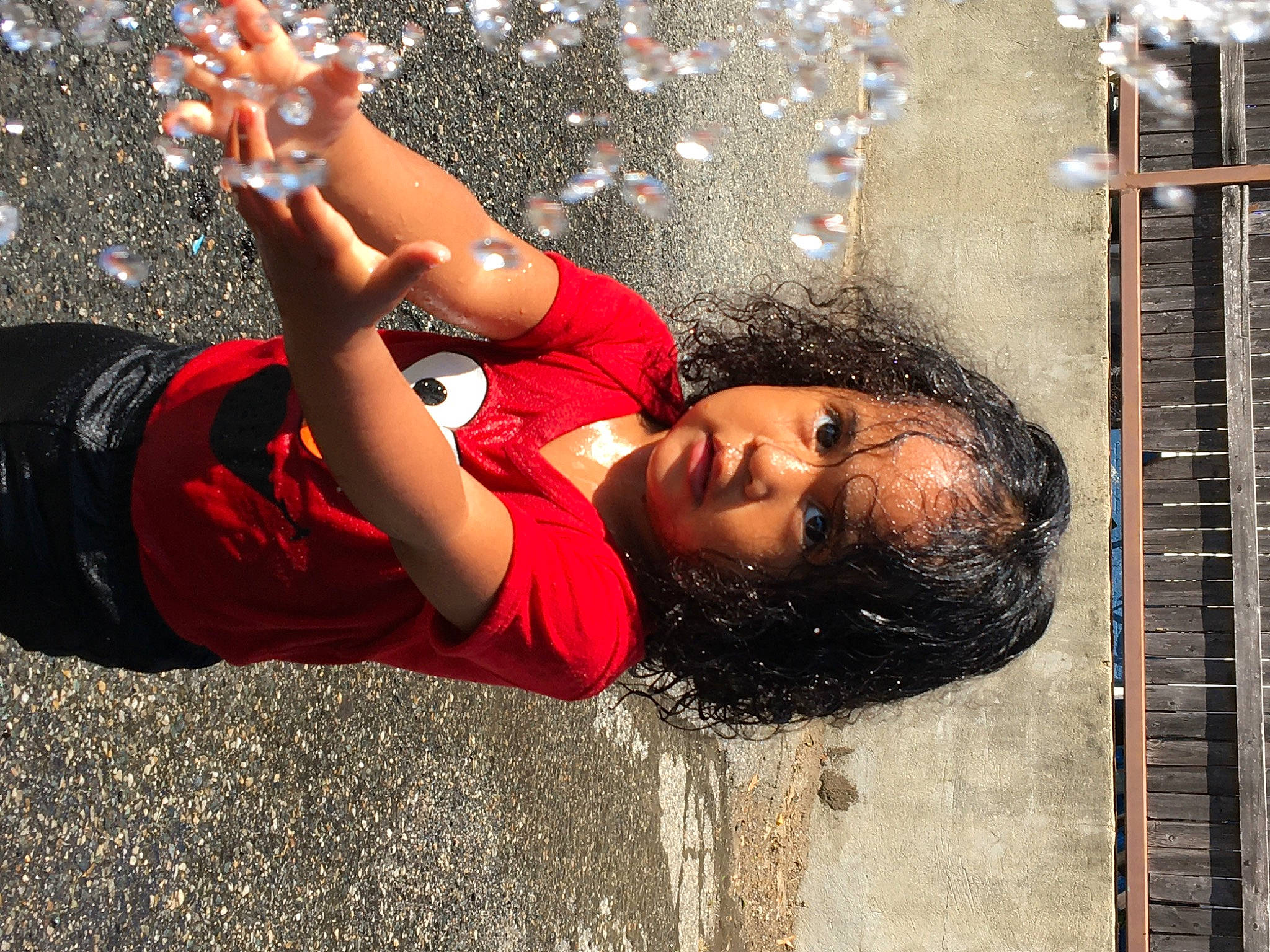 Cataleya joined the competition — help win amazing prizes! carmine, child, competition_event, fashion_accessory, flash_photography, fun, gesture, grass, happy, human_leg, leisure, liquid_bubble, people_in_nature, person, play, portrait_photography, recreation, soil, sportswear, water