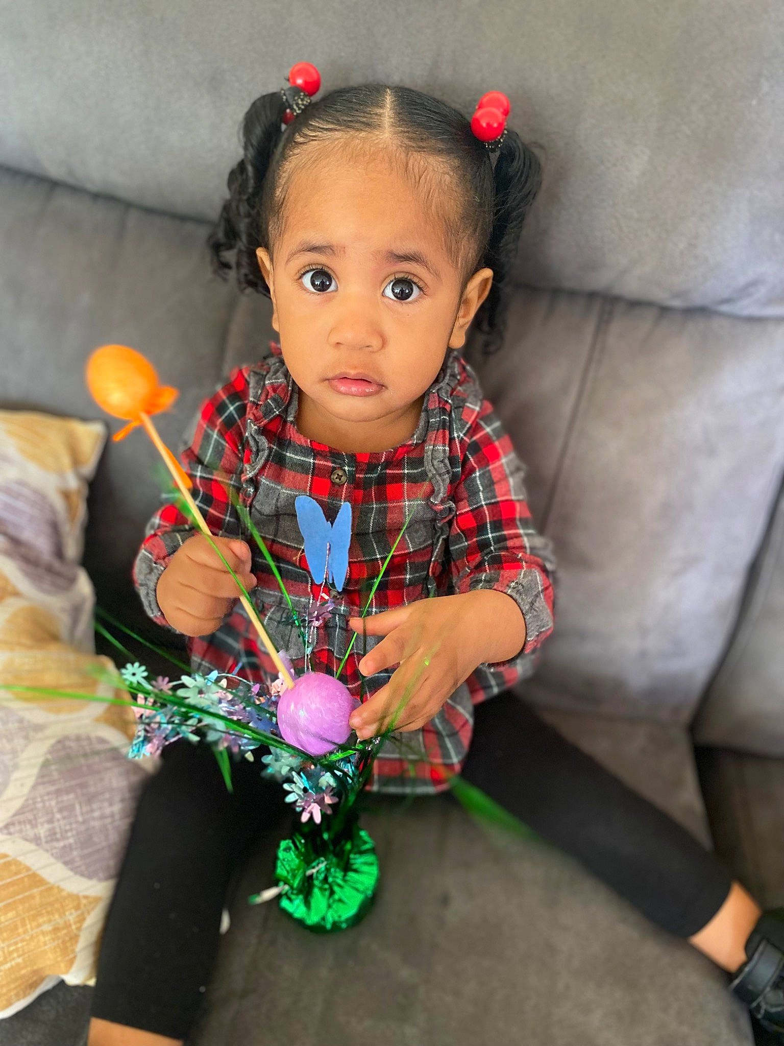 Cataleya is registered to the contest to win money with this photo: baby, baby_toddler_clothing, cheek, child, dress, fashion_accessory, fashion_design, head, jewellery, neck, ornament, outerwear, pattern, person, plaid, sitting, skin, sleeve, tartan, textile