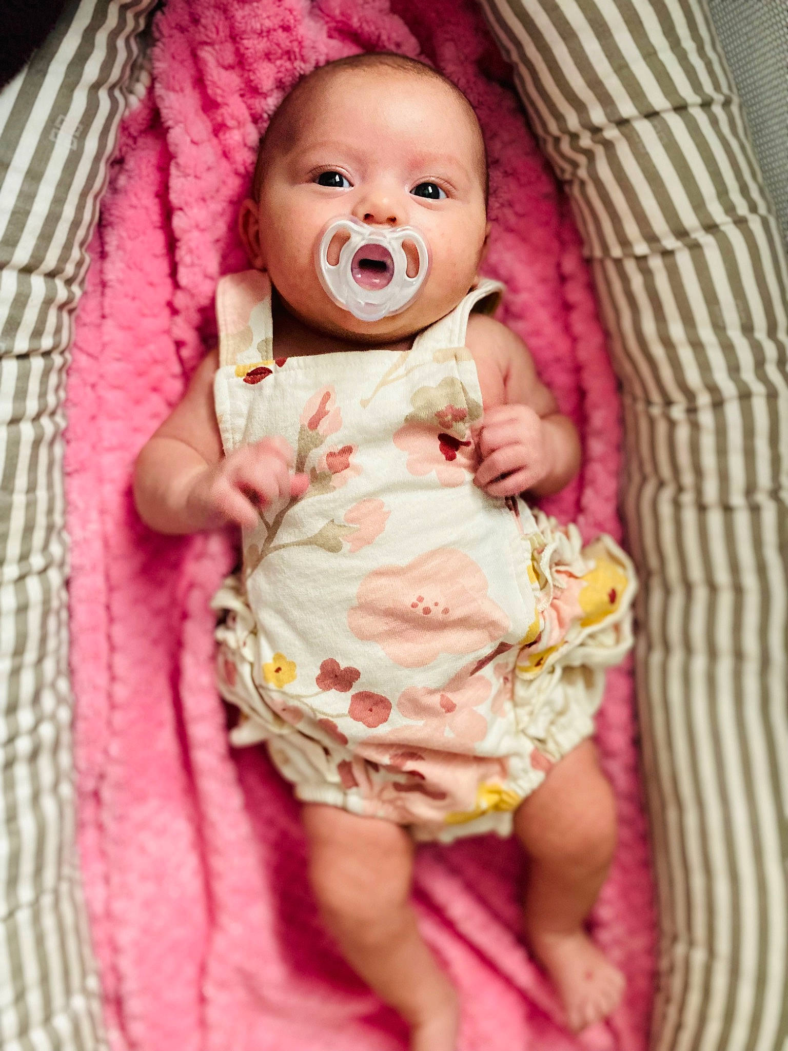 Blakeleigh is registered to the contest to win money with this photo: baby, baby_products, baby_safety, baby_toddler_clothing, cheek, comfort, dress, happy, infant_bed, iris, linens, lip, magenta, nose, person, pink, skin, sleeve, smile, textile
