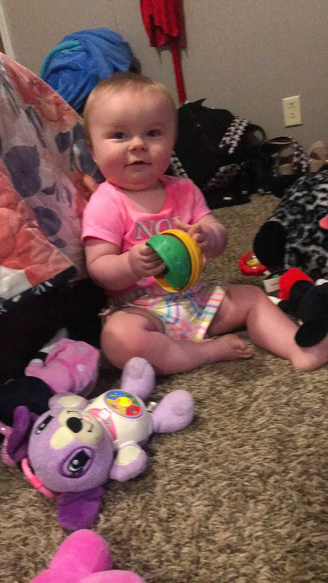 Nevaeh is registered to the contest to win money with this photo: baby, baby_toddler_clothing, cheek, child, eye, face, finger, fun, happy, head, leg, mammal, people, person, photograph, pink, skin, smile, thigh, toddler