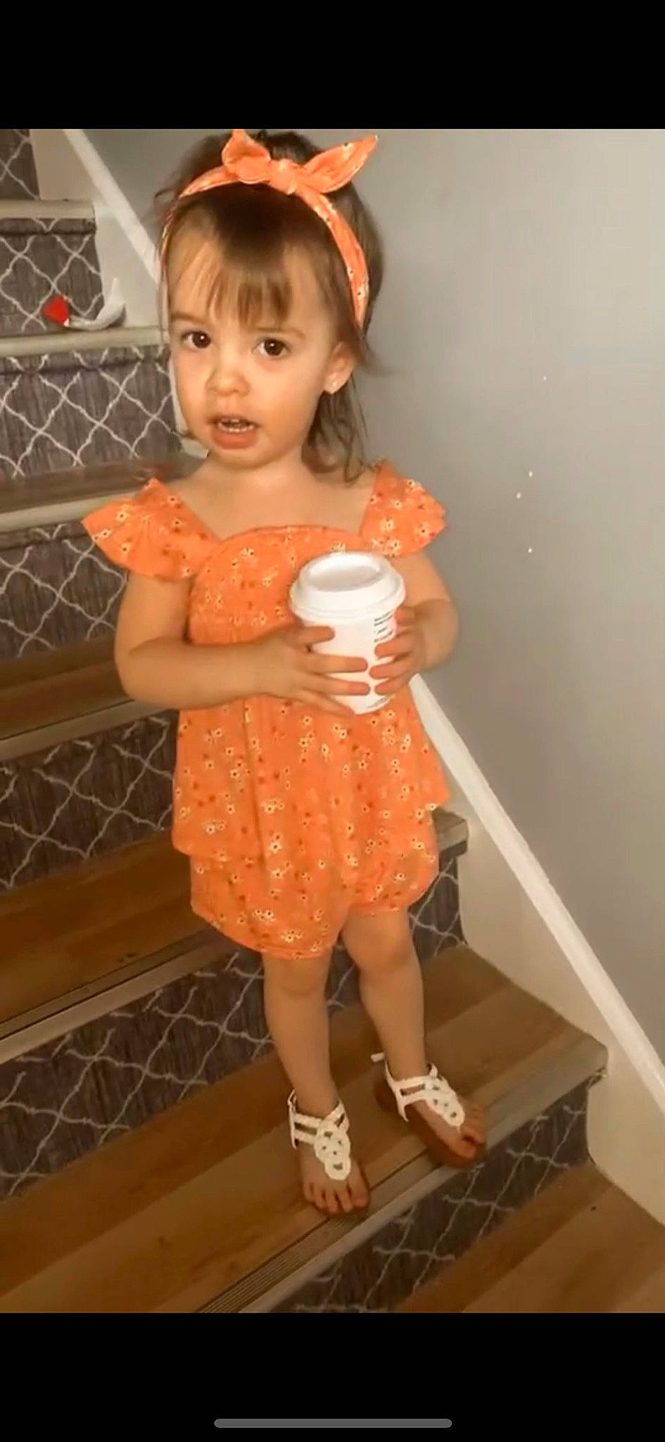 Frankie is registered to the contest to win money with this photo: arm, baby_toddler_clothing, dress, finger, footwear, hair, hairstyle, hand, joint, knee, leg, neck, person, pink, shorts, skin, standing, thigh, thumb, toddler