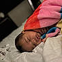 baby, sleeping, blanket, bed, cozy, child, pillow, soft, cute, peaceful, indoor, comfort, rest, toddler, snuggled, colorful, warm, face, hand, quiet