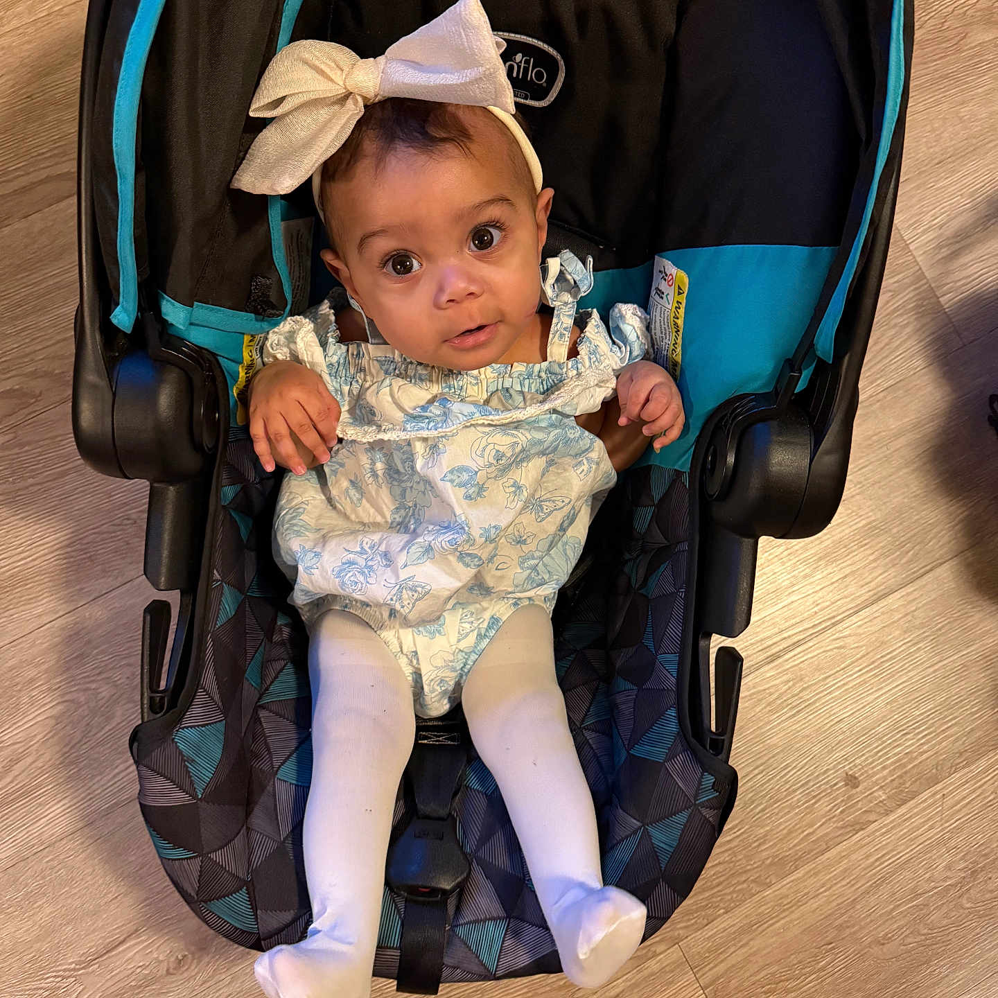 Kataleya is registered to the contest to win money with this photo: accessories, baby, bed, bonnet, car, clothing, dress, face, furniture, hardwood, hat, head, newborn, person, photography, portrait, stroller, transportation, vehicle, wood