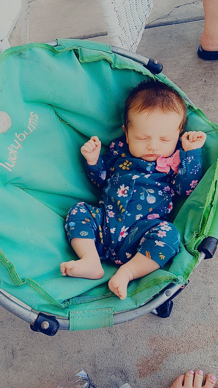 Lillianna joined the competition — help win amazing prizes! baby, baby_carriage, baby_products, baby_toddler_clothing, blue, chair, child, comfort, electric_blue, facial_expression, fun, grass, green, head, lap, leisure, person, recreation, sitting, toddler