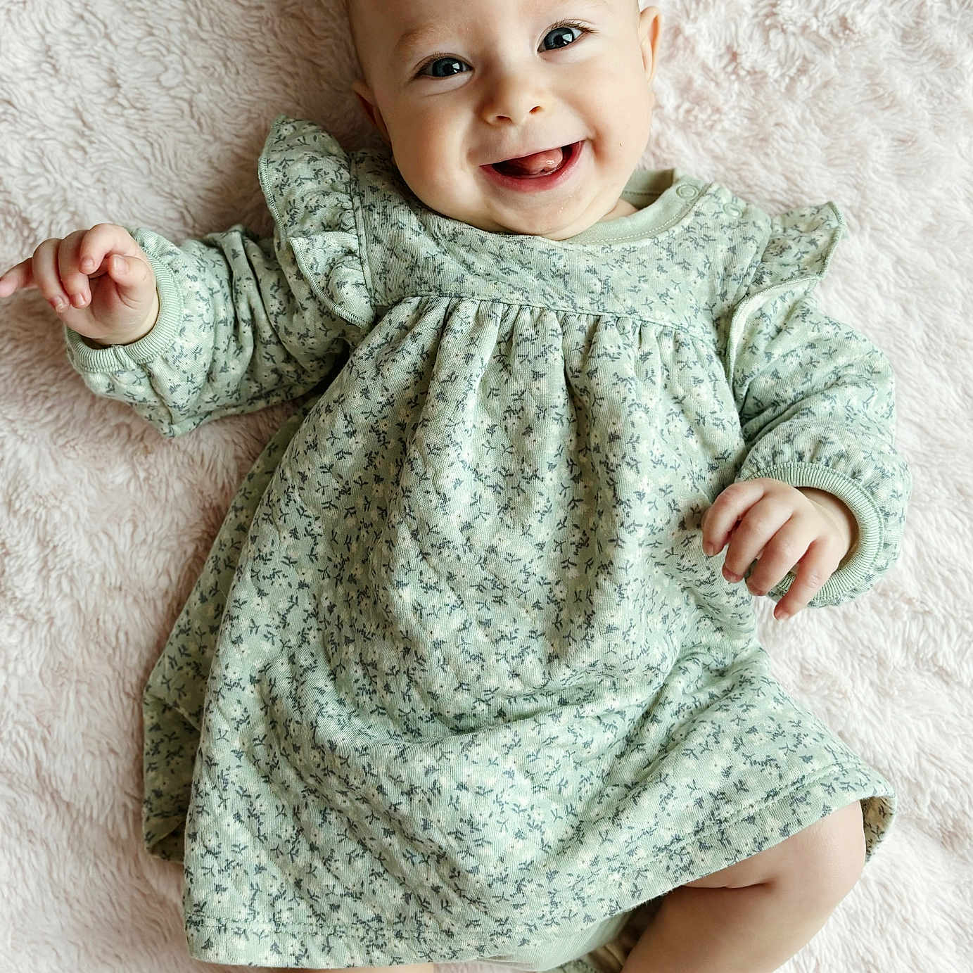 Ellenore joined the competition — help win amazing prizes! baby, babylaughing, bodypart, clothing, dress, face, finger, hand, happy, head, laughing, longsleeve, newborn, pattern, person, photography, portrait, sitting, sleeve, smile