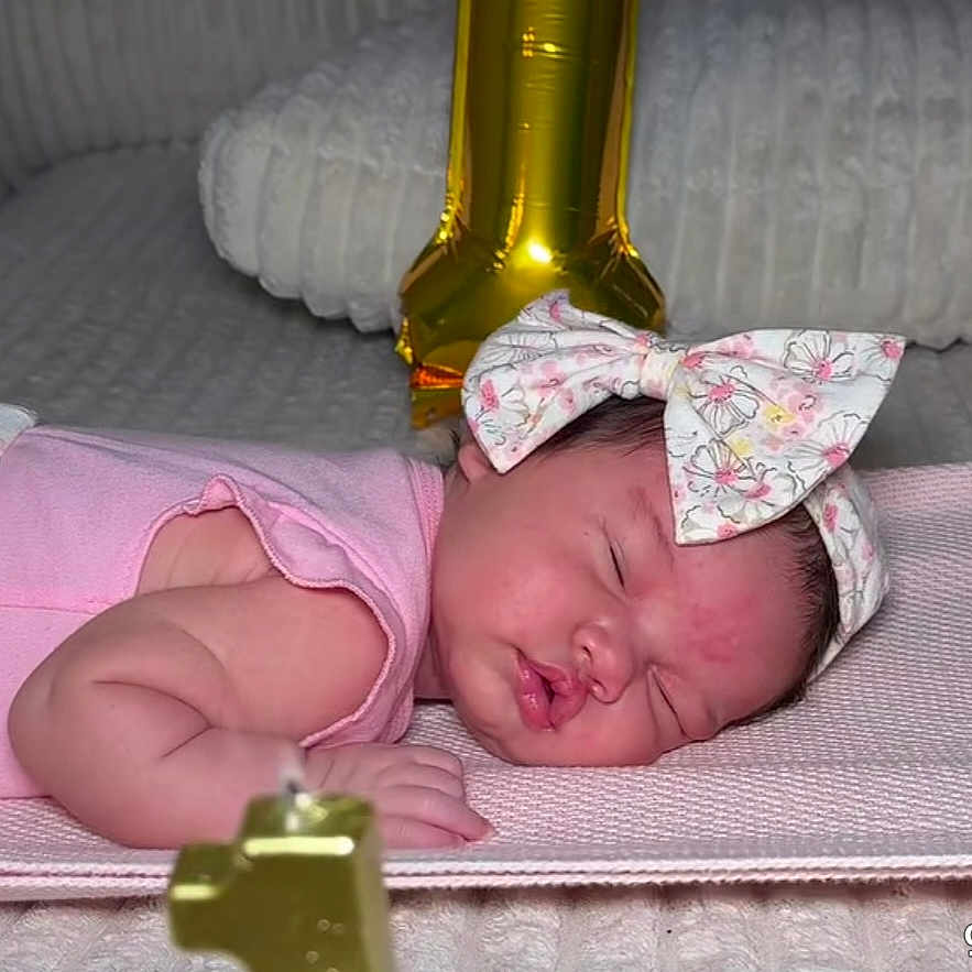 Diana joined the competition — help win amazing prizes! newborn, baby, sleeping, portrait, birthday, cake, number_one, balloon, gold, bow, pink, headband, infant, indoors, couch, blanket, celebration, sweet, closeup, photography