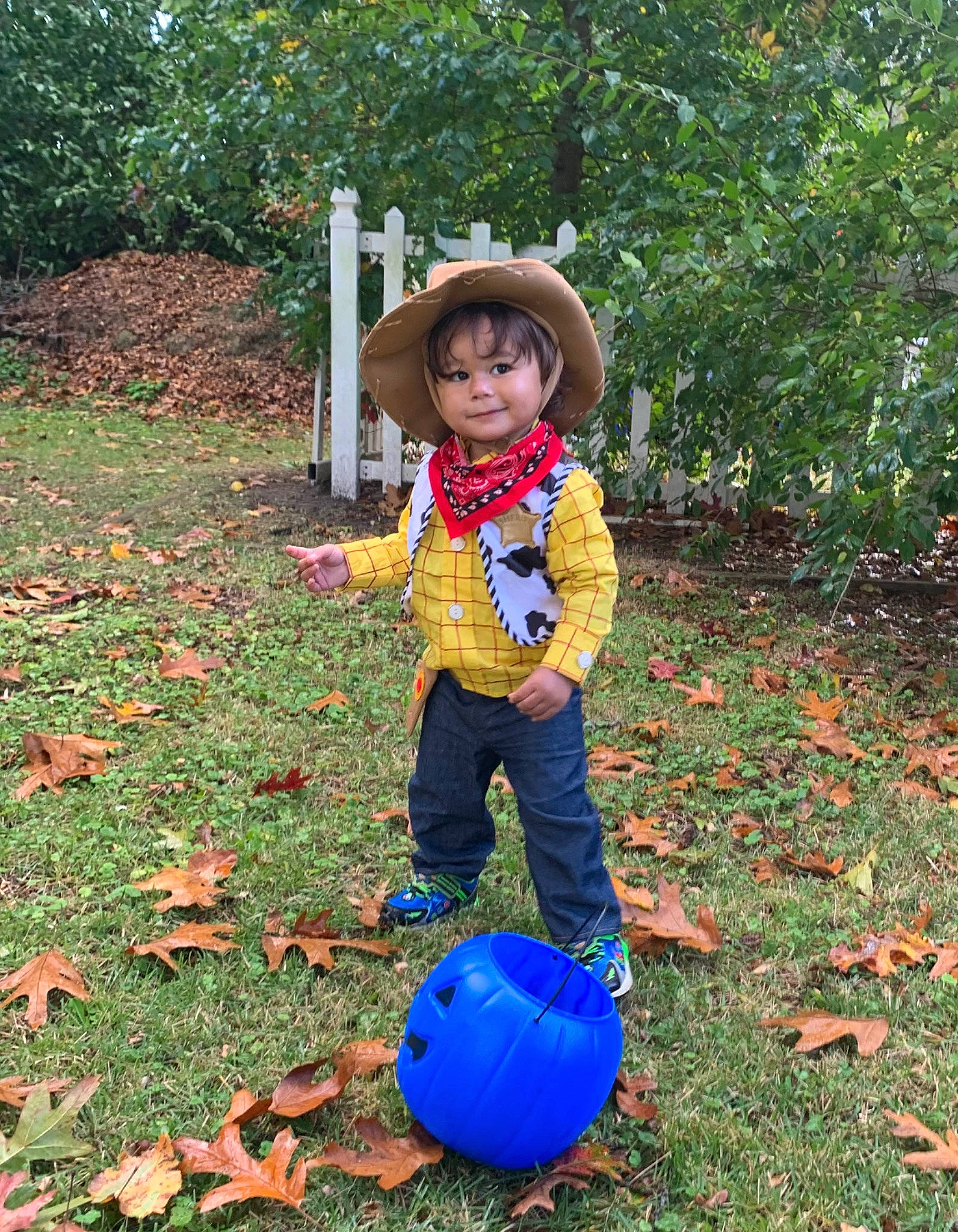 Jayden is registered to the contest to win money with this photo: ball, botany, cowboy_hat, electric_blue, fun, garden, grass, happy, hat, jeans, leaf, nature, outerwear, people_in_nature, person, plant, pumpkin, smile, sun_hat, toddler